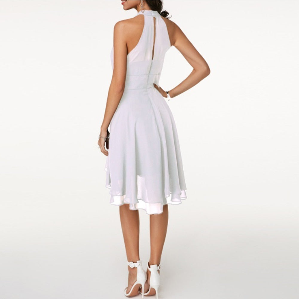 Emma | Vestido corto elegante de mujer con cuello halter y caída fluida
