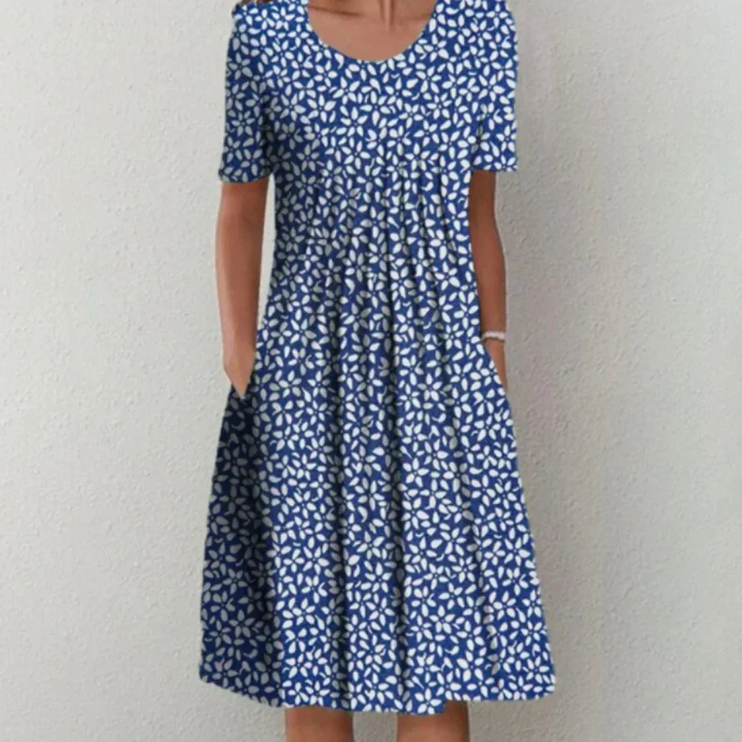 Clara | Mujer vestido midi floral con manga corta y bolsillos