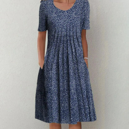 Clara | Mujer vestido midi floral con manga corta y bolsillos