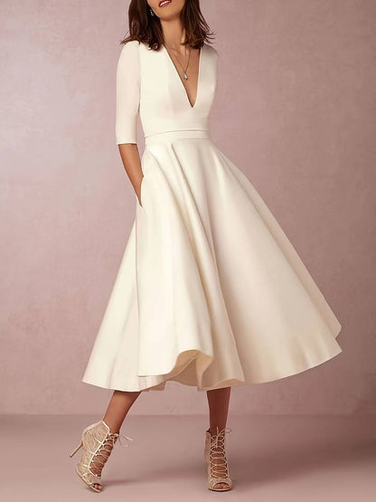 Isabela | Vestido midi de invitada con falda acampanada elegante para mujer
