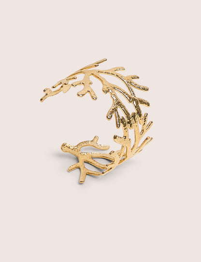 Brazalete inspirado en la vida marina en oro