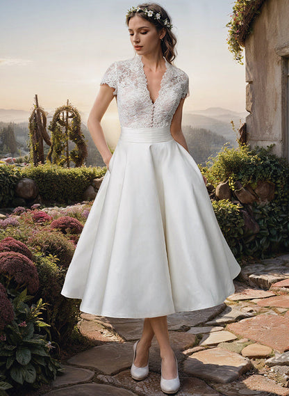 Querina | Vestido midi de encaje con falda fluida corte A | Corte A