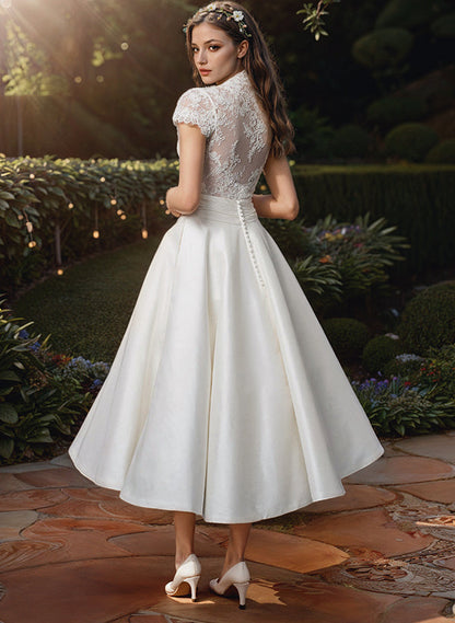 Querina | Vestido midi de encaje con falda fluida corte A | Corte A