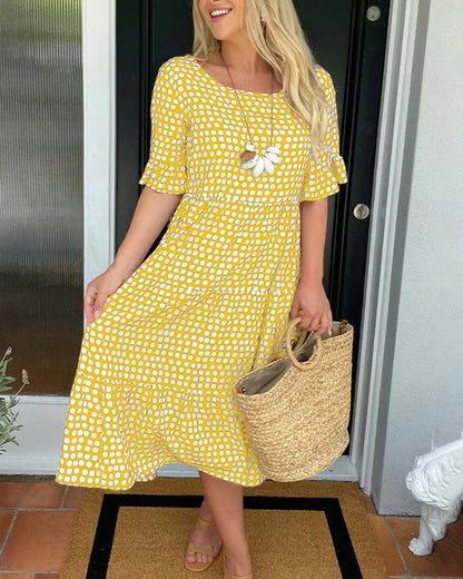 Estrella | Vestido midi relajado con lunares y manga corta