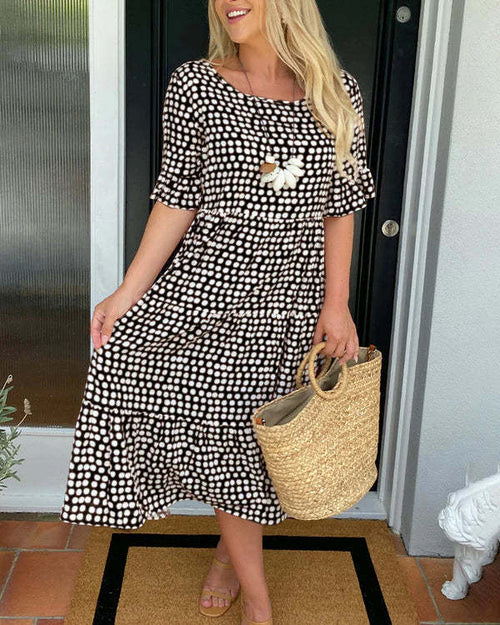 Estrella | Vestido midi relajado con lunares y manga corta