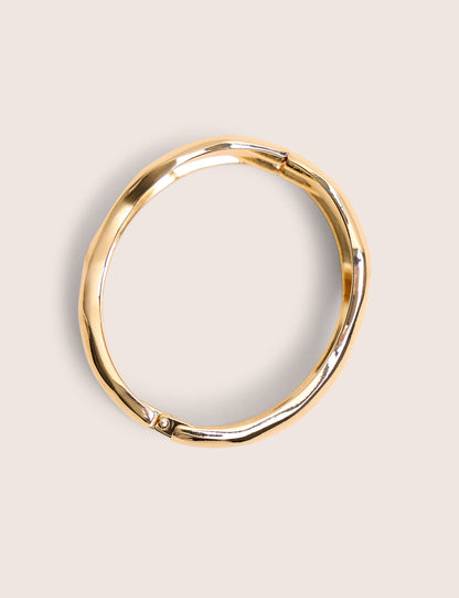 Brazalete dorado grueso con cierre único