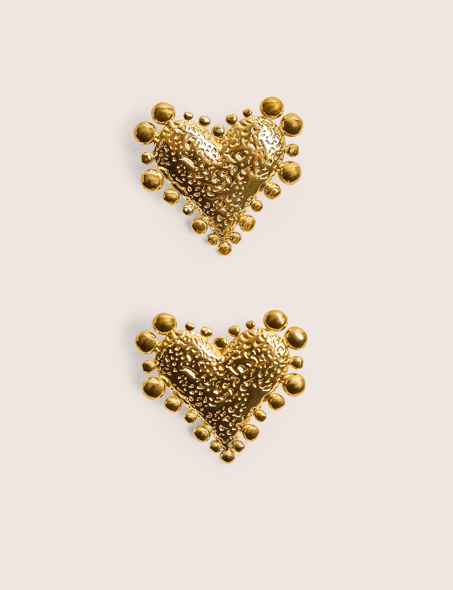 Pendientes en forma de corazón bañados en oro