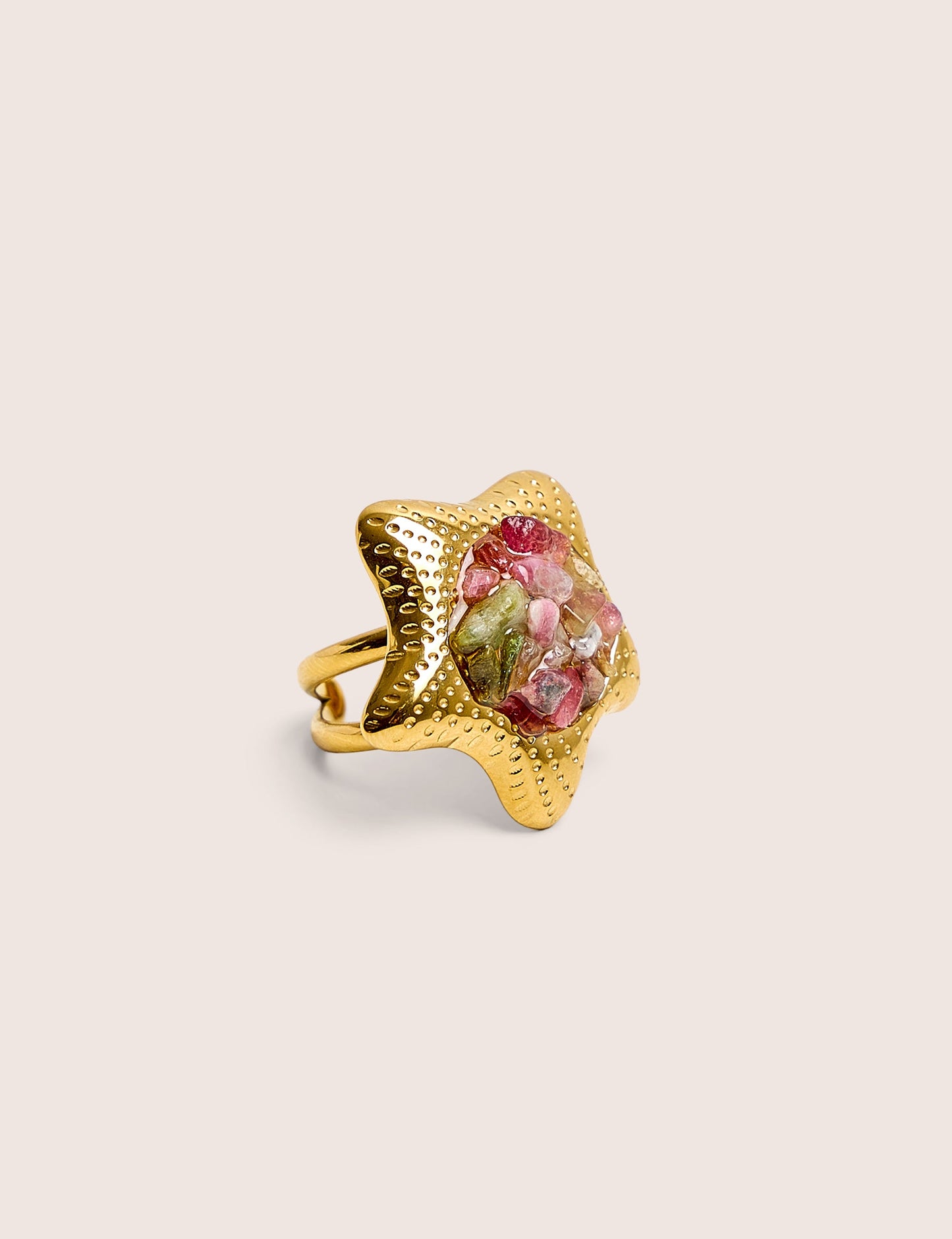Anillo ajustable con estrella y detalle de piedra