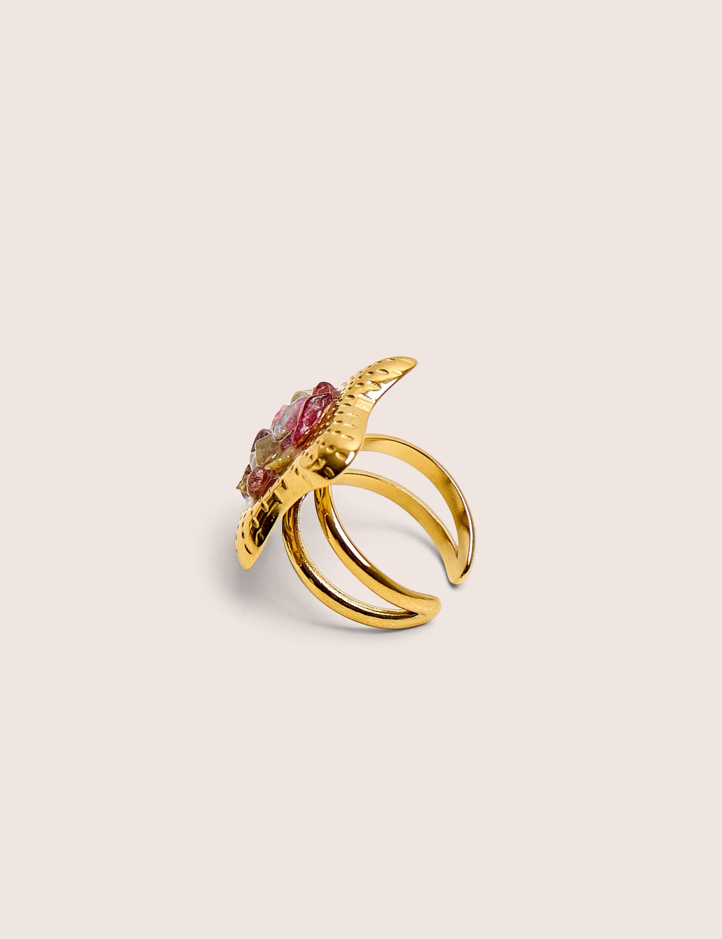 Anillo ajustable con estrella y detalle de piedra