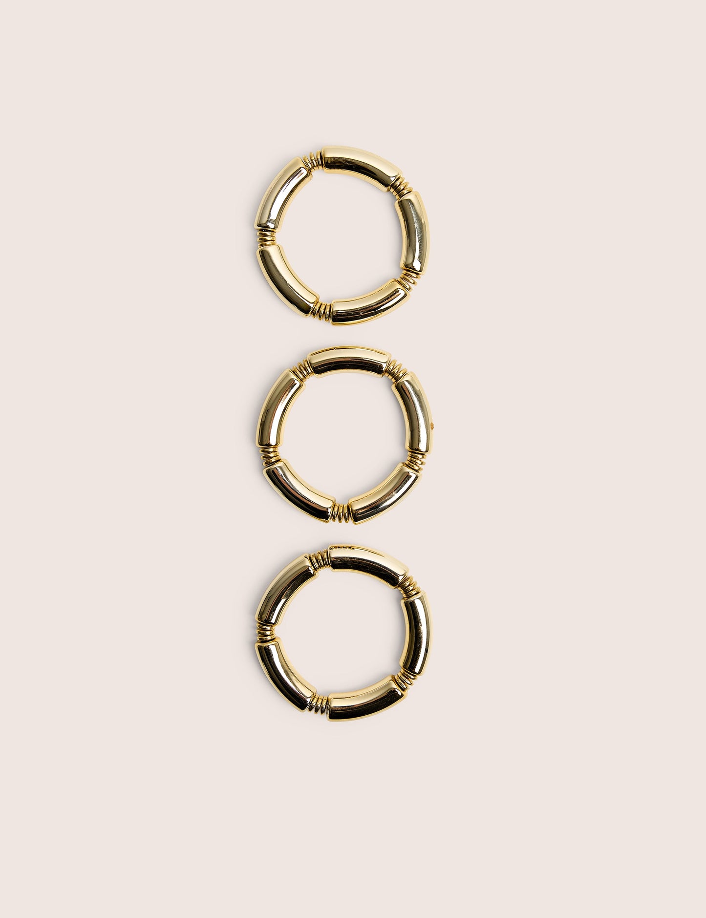 Paquete de tres pulseras de oro