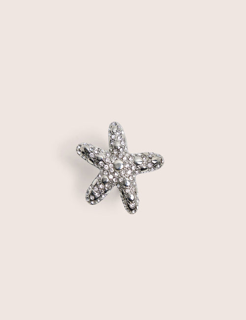 Anillo de estrella de mar con diamante en plata