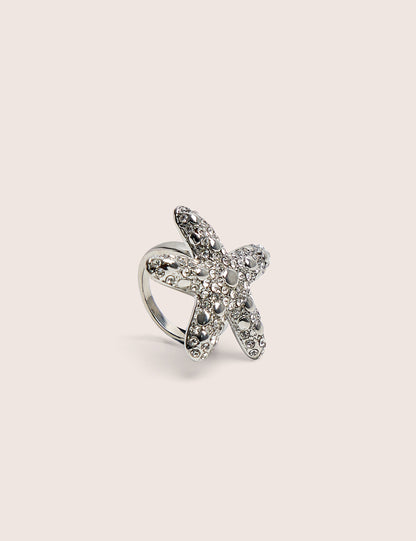 Anillo de estrella de mar con diamante en plata