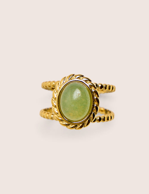 Anillo de resina ajustable con detalle torcido en oro
