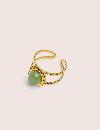 Anillo de resina ajustable con detalle torcido en oro