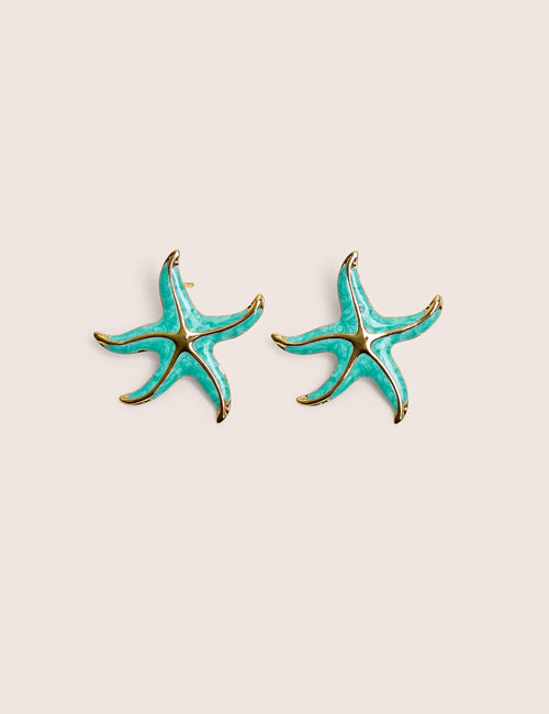 Arete de estrella de mar azul con detalle dorado