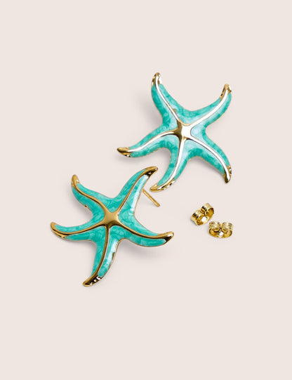 Arete de estrella de mar azul con detalle dorado
