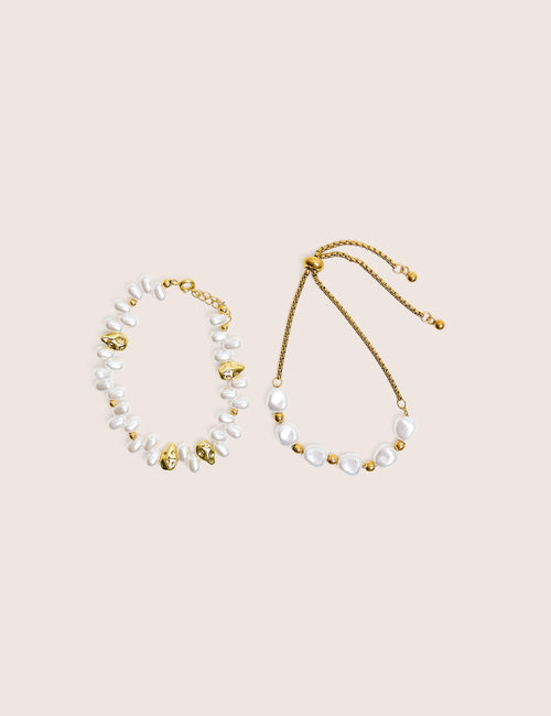 Conjunto de dos pulseras con detalle de perlas bañadas en oro