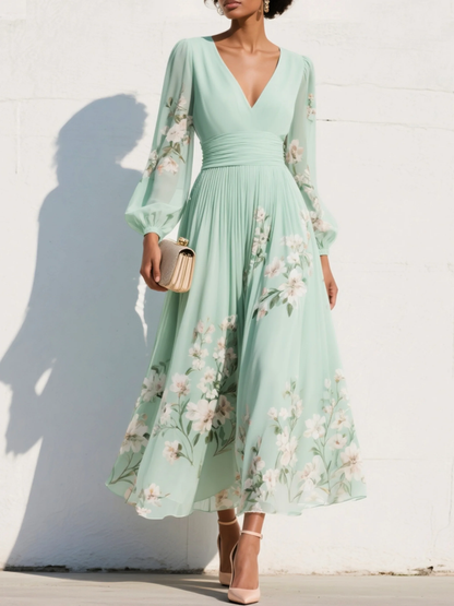 Cisella | Vestido midi verde claro con estampado floral