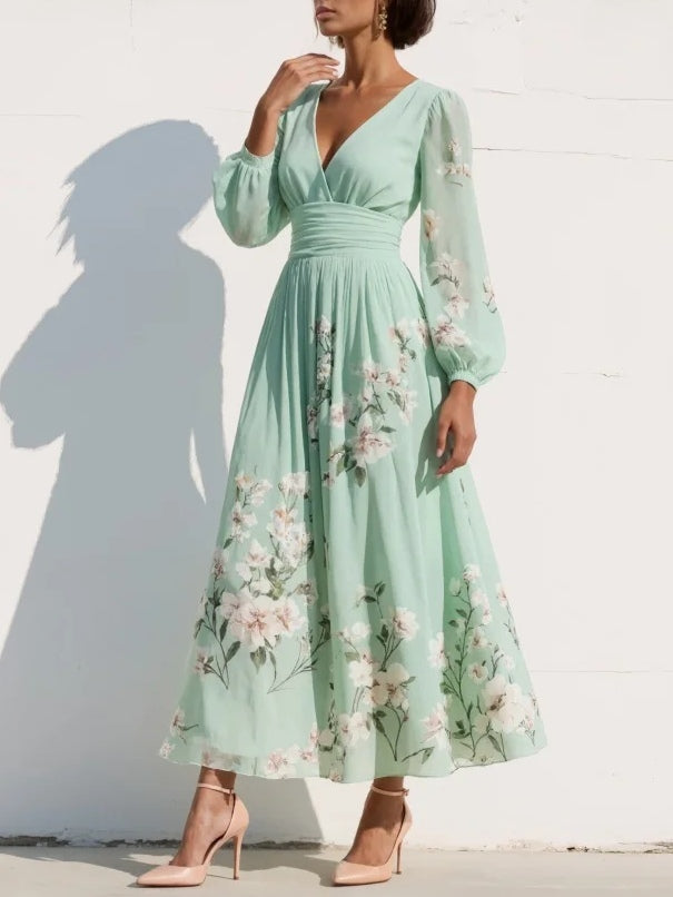 Cisella | Vestido midi verde claro con estampado floral