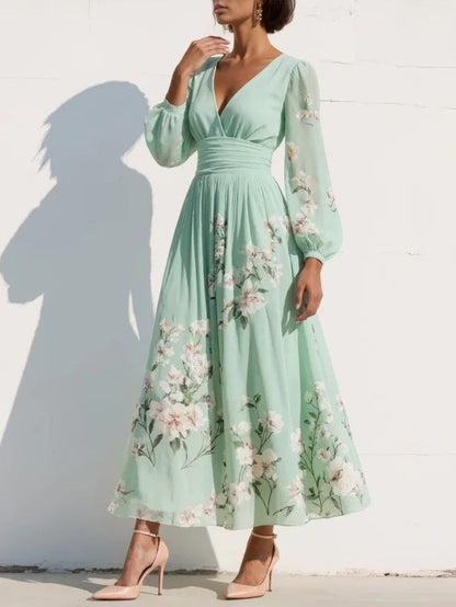 Cisella | Vestido midi verde claro con estampado floral