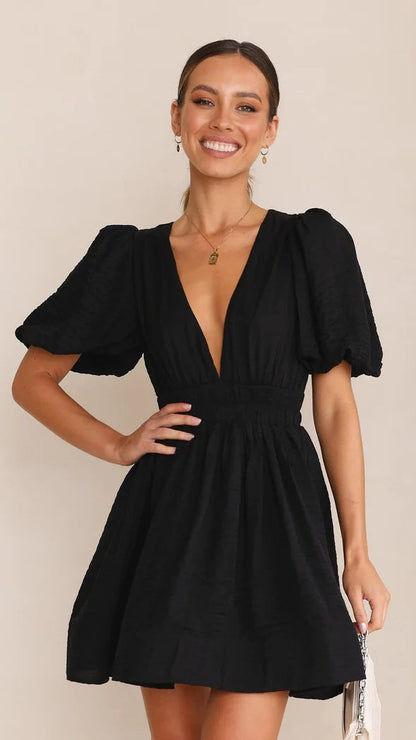 Darsela | Vestido mini de primavera con mangas abullonadas para mujer