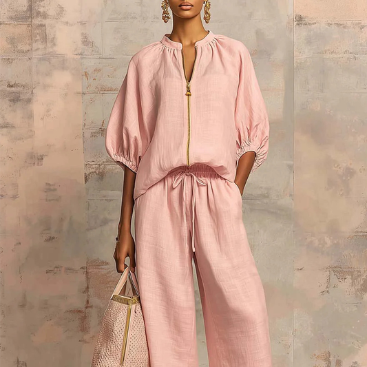 Conjunto mujer elegante con blusa de cremallera y pantalón fluido