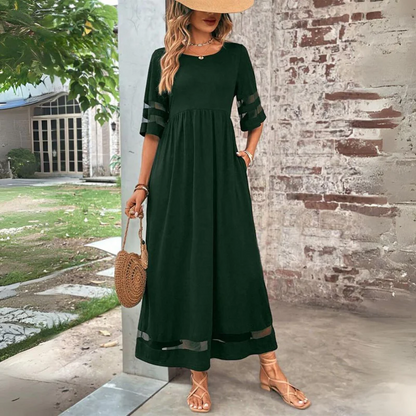Vestido largo femenino de tejido ligero con detalles transparentes