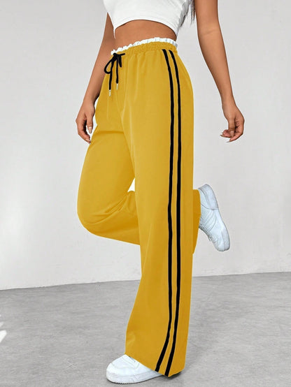 Noelia | Pantalón de Ropa Deportiva Mujer Pierna Ancha Franjas Laterales