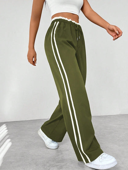Noelia | Pantalón de Ropa Deportiva Mujer Pierna Ancha Franjas Laterales