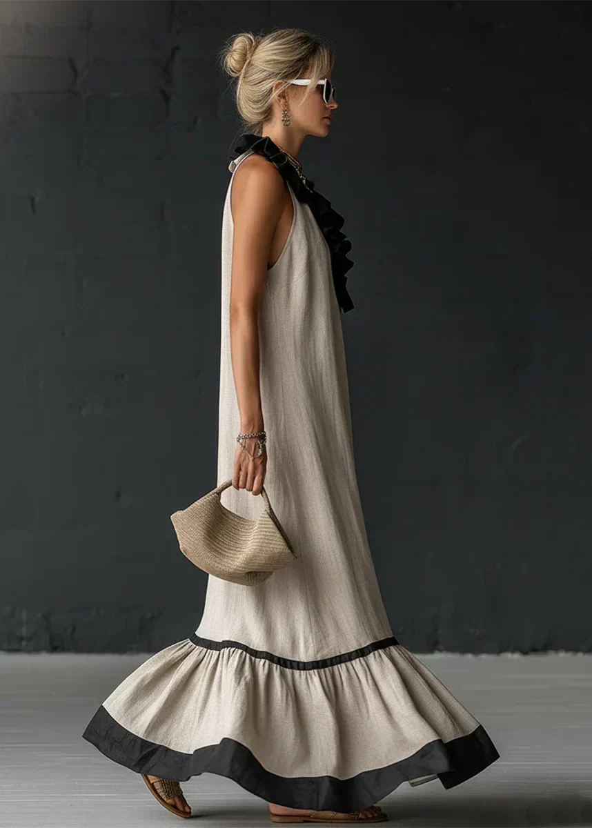 Vestido largo de mujer con volantes y cuello halter