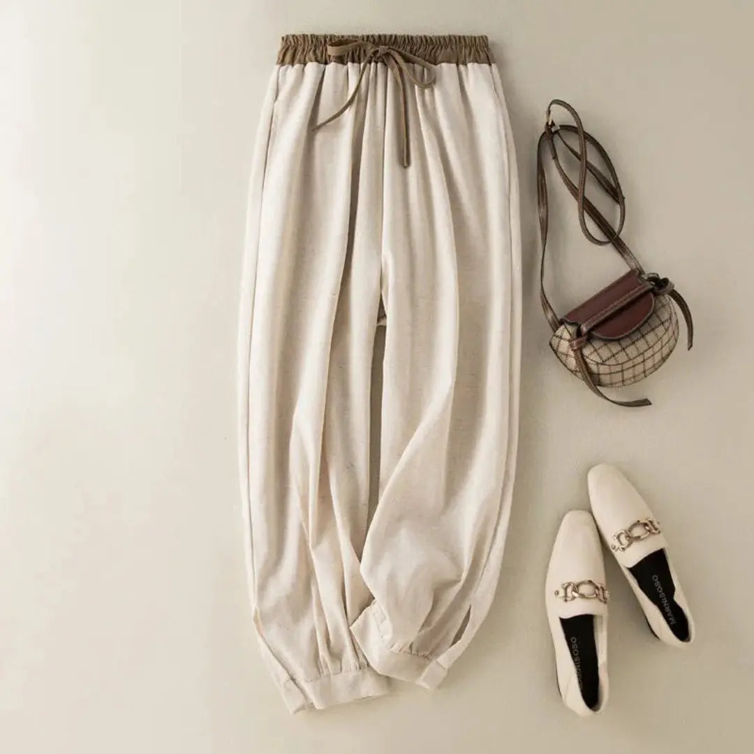 Pantalón de mujer con cintura elástica, cordón ajustable, pernera estrecha y puños fruncidos