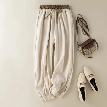 Pantalón de mujer con cintura elástica, cordón ajustable, pernera estrecha y puños fruncidos