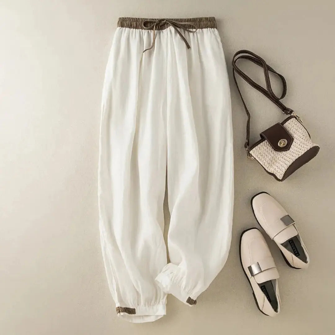 Pantalón de mujer con cintura elástica, cordón ajustable, pernera estrecha y puños fruncidos
