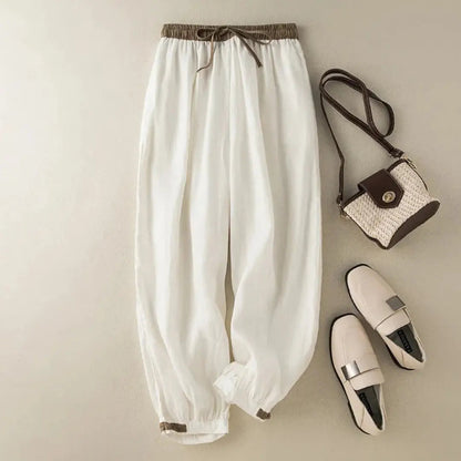 Pantalón de mujer con cintura elástica, cordón ajustable, pernera estrecha y puños fruncidos