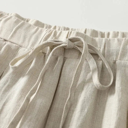 Pantalón de mujer de tiro alto con pernera ancha, cordón ajustable y bolsillos laterales